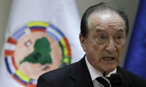 Acting President of the South American Soccer Federation (CONMEBOL) Eugenio Figueredo gives his first news conference since taking charge in Asuncion, Paraguay, in this April 30, 2013 file photo. The Swiss Federal Office of Justice (FOJ) said it had blocked accounts at several banks in Switzerland after police arrested some of the most powerful figures in global soccer on May 27, 2015 in U.S. and Swiss corruption cases. The FOJ said a further wanted soccer official had been arrested on a request from the United States and named Eugenio Figueredo, Eduardo Li, Jose Maria Marin, Julio Rocha, Costas Takkas, Jeffrey Webb, and Rafael Esquivel as the seven officials currently in detention pending extradition.  
REUTERS/Jorge Adorno/Files
